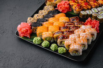 Sushi set on the black plate