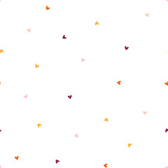 Seamless pattern with colorful tiny hearts