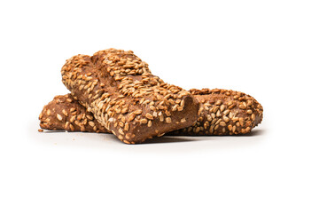 Loaf of bread with sunflower seeds isolated on a white background.