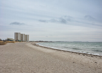 Fehmarn beach on the baltic sea with Hotels in the background in the low season