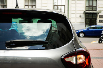 Vinyl car sticker mockup, rear window mockup outdoors