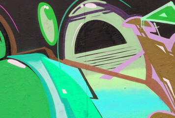 Colorful background of graffiti painting artwork with bright aerosol strips on metal wall. Old...