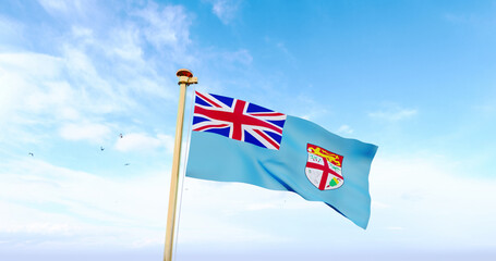Flag of Fiji national flag waving in the wind, sky and sun background. Fiji Flag.