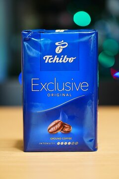 Closeup of a front side of Tchibo bran exclusive ground coffee in a bag on a table