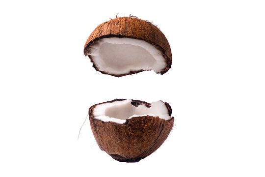 Two coconut section halves isolated on transparent background
