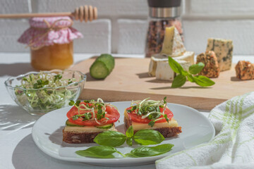 Freshly made vegetarian sandwich with alfalfa sprouts and cheese
