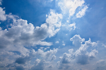 Naklejka na ściany i meble Blue sky background and clouds