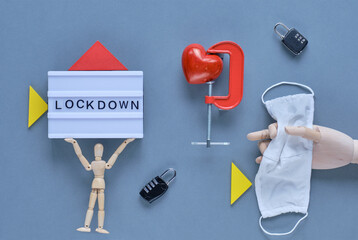 abstract lockdown symbols are laid around the letters 'LOCKDOWN'