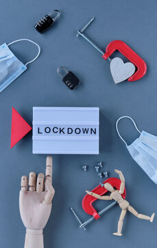 abstract lockdown symbols are laid around the letters 'LOCKDOWN'