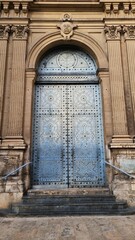 Vertical shot of a Moorish doorway in the city of Valencia, Spain.