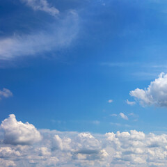 Beautiful blue sky with white clouds as a natural background. - 581183698