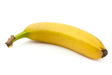 Close-up of one banana lying isolated on white background. © malshak_off