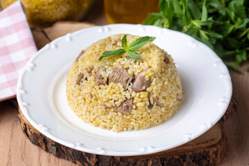 From traditional delicious Turkish cuisine; Bulgur pilaf with meat (Turkish name; etli bulgur pilavi)