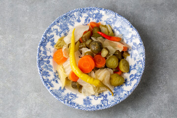 Assorted mixed pickled vegetables in bowl - plate, Turkish name; tursu.