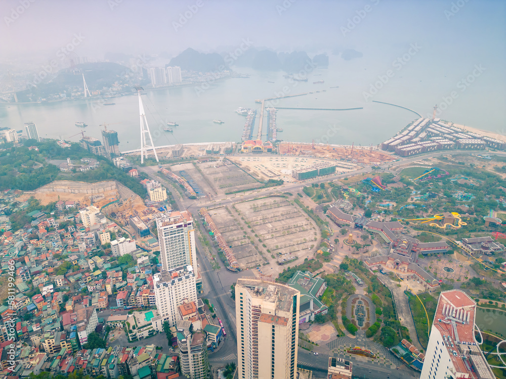 Wall mural Aerial view of Bai Chay Bridge is located on Highway 18, connecting two parts of Ha Long City, Hon Gai City and Bai Chay City through Cua Luc Bay, which flows into Ha Long Bay