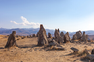 Fototapeta na wymiar Standing stones in Zorats-Karer or Karahunj. Ancient megalithic complex, Syunik region of Armenia.