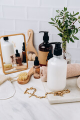 Bottles shampoo or shower gel or Lotion, essential oil, cream, massage brushes, Body and face care beauty bath set