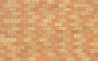 Wall texture in orange and yellow bricks, background, mosaic