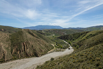 A dry river running through the mountains in the south of Granada