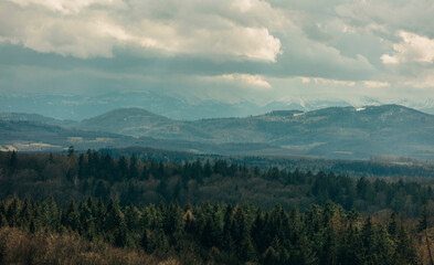 Rain clouds over Sudetes mountains in spring time, March