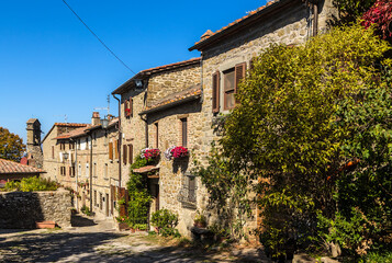 Fototapeta na wymiar Cortona, Italy. Colorful medieval stone houses