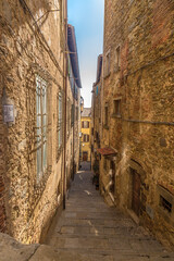 Obraz premium Cortona, Italy. Narrow lane of a medieval city