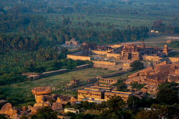 Fototapeta na wymiar View of Hampi ruins at sunrise from Matanga hill