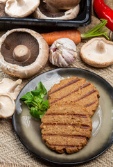 Tasty vegetarian burgers made from healthy quinoa, basil, portobello champignon and shiitake mushrooms