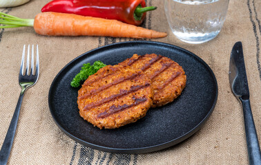 Tasty vegan burgers made from vegetarian plant based soya beans imitation meat