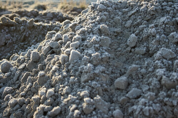 a pile of mineral concrete on a construction site