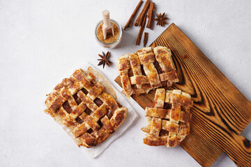 Pastry with jam and cinnamon on a white background, copy space, top view