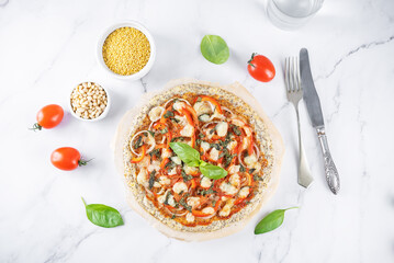 Millet pine nuts Chia seeds pizza crust with tomato; red bell pepper, onion and basil