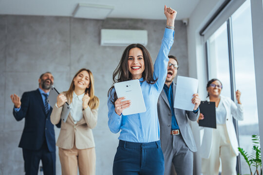 Euphoric Excited Business Team Celebrate Corporate Victory Together In Office, Happy Overjoyed Professionals Group Rejoice Company Victory, Teamwork Success Win Triumph Concept At Conference Table