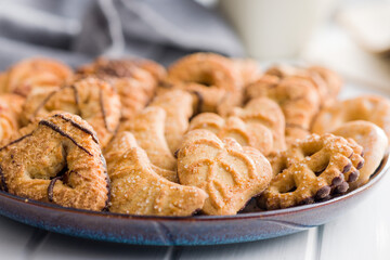 Assorted various cookies. Sweet biscuits on plate.