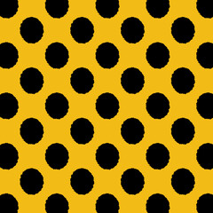 Tile pattern with black polka dots on yellow background. Textures.