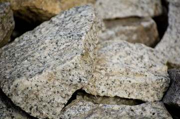 Loose granite stones lying on the street.