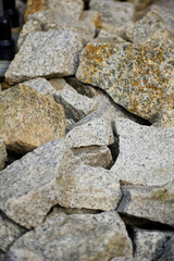 Loose granite stones lying on the street.