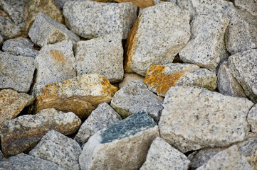 Loose granite stones lying on the street.