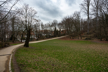 Green lawn and bending walking path in the Duden park, Forest,  Brussels, Belgium