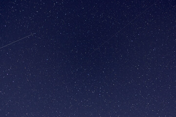 Quadrantids Meteor Shower 2023 The night sky traces of a falling meteorite. - 581234470