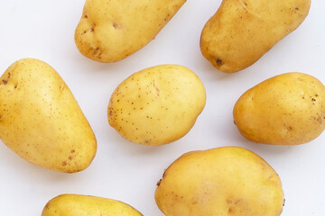 Fresh patatoes on white background.
