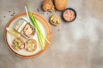 Sandwich with cod liver on rye bread. Healthy food concept. Long banner format. top view