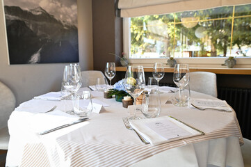 Beautiful table set for an event party or wedding reception. Restaurant interior