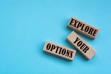 Explore Your Options - words from wooden blocks with letters, Business concept
