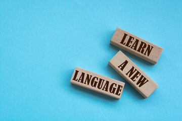 Learn A New Language - words from wooden blocks with letters