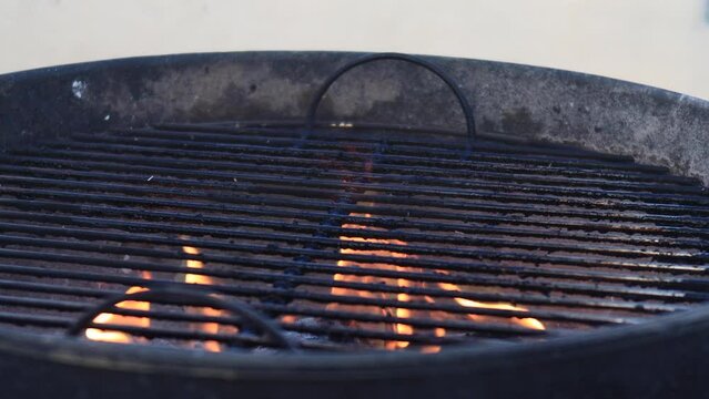 Charcoal Barbeque pit with grate and flames