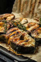 Delicious grilled sturgeon fish steaks. Food recipe background. Close up