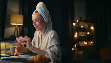 Positive lady dancing home workplace closeup. Smiling woman singing making notes