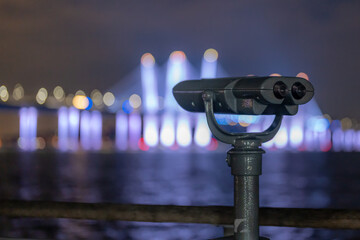 Tarrytown, NY - USA - February 2, 2023: Binoculars at Tarrytown Overlook with the Governor Mario M....