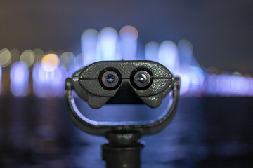 Tarrytown, NY - USA - February 2, 2023: Binoculars at Tarrytown Overlook with the Governor Mario M....